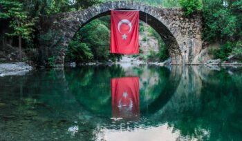 turkey flag hanging on bridge