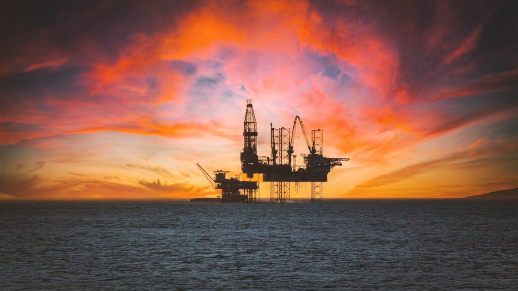 sunset over oil platform