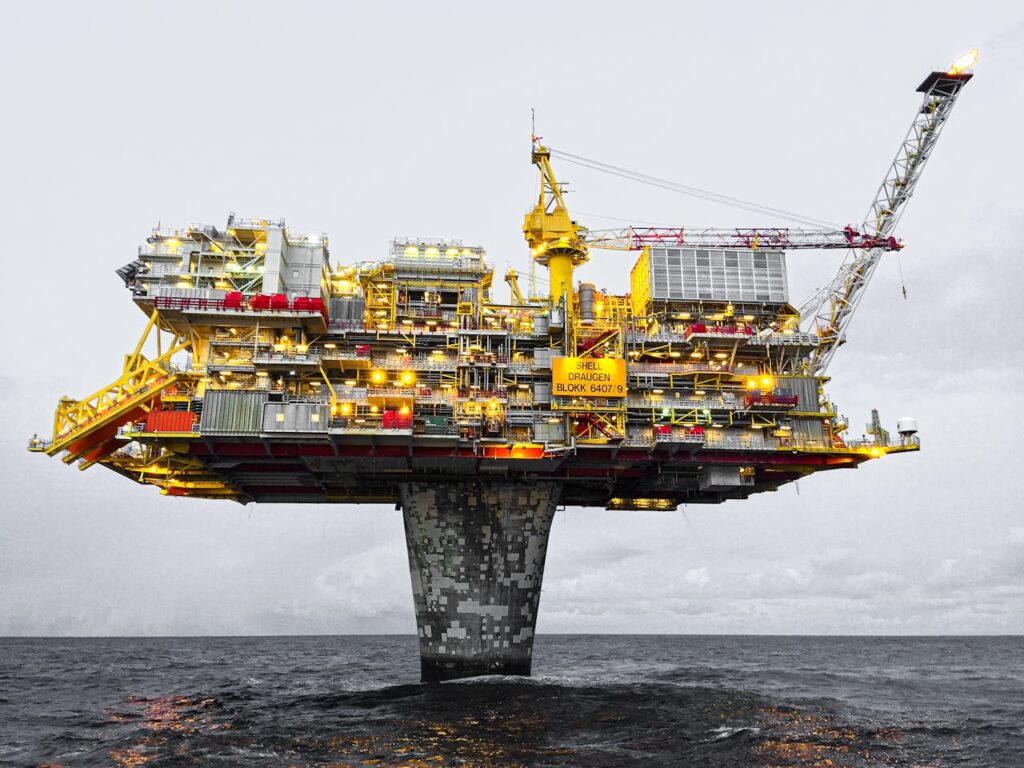 Photo by Jan-Rune Smenes Reite: https://www.pexels.com/photo/offshore-drilling-rig-on-body-of-water-3216911/