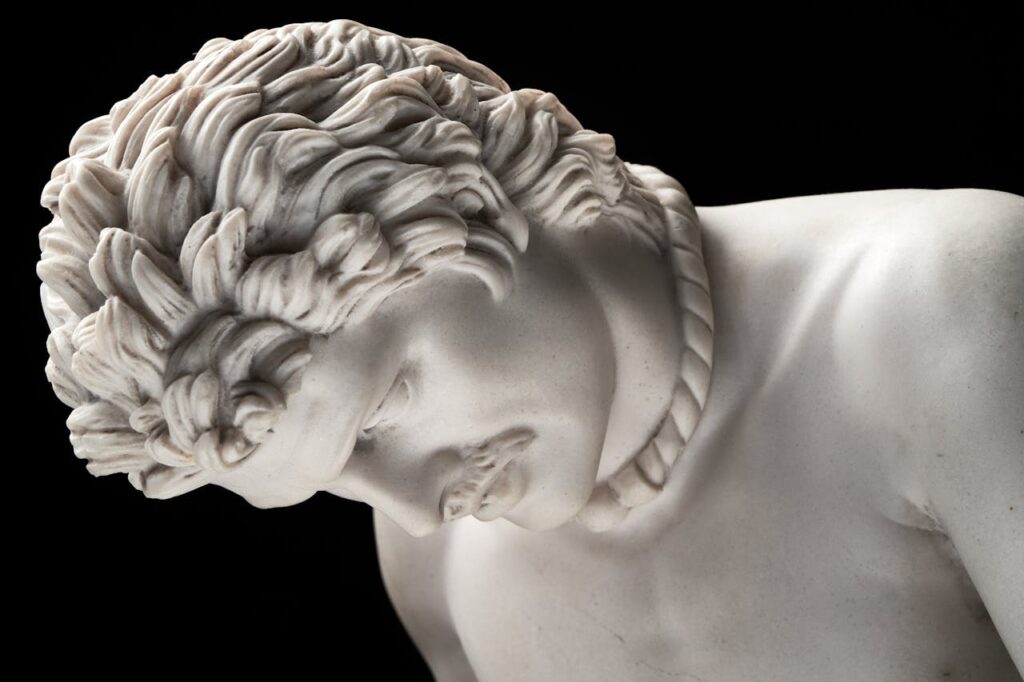Photo by Wellington Silva: https://www.pexels.com/photo/close-up-shot-of-a-white-statue-14638635/